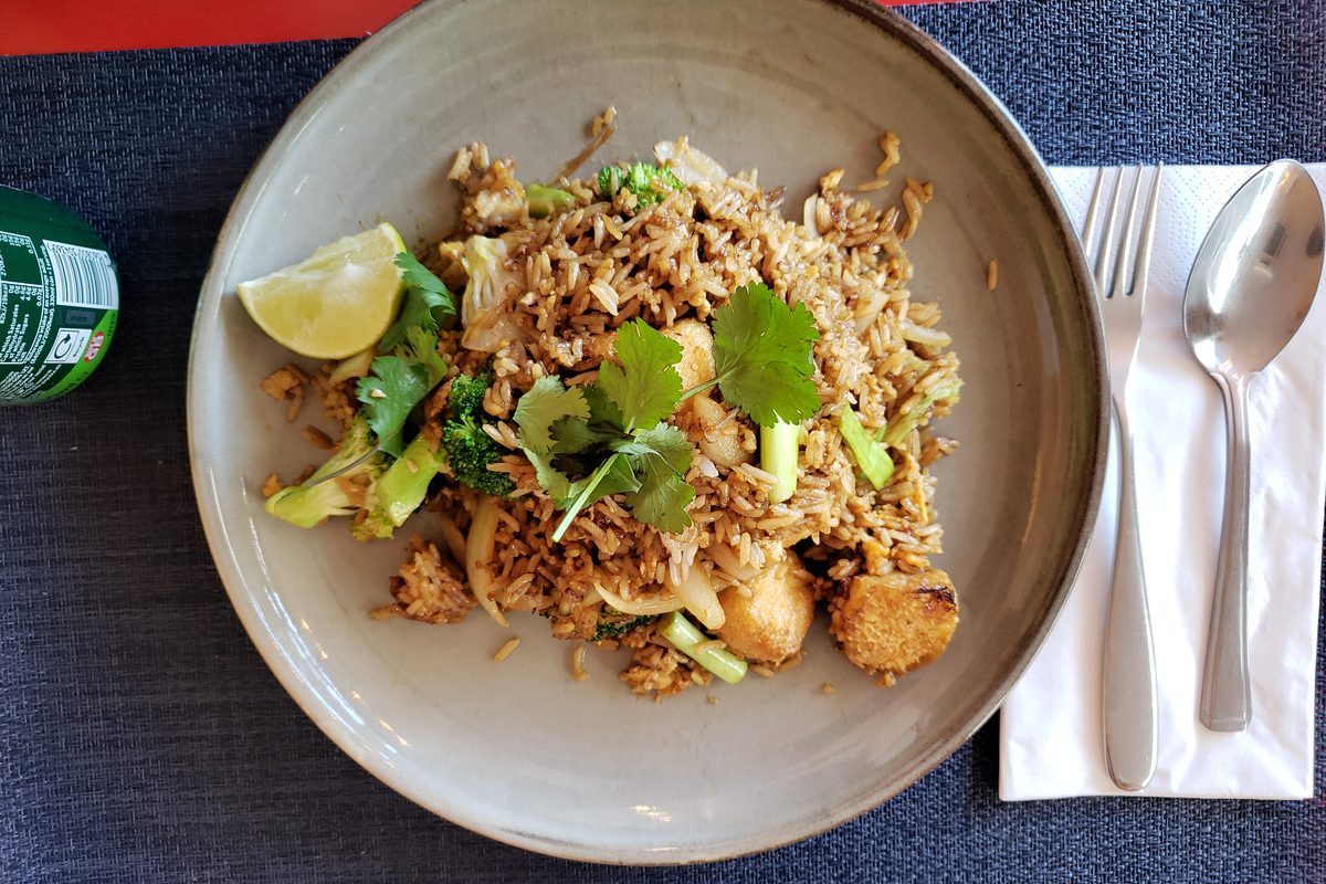 Plate of fried rice with tofu and vegetables